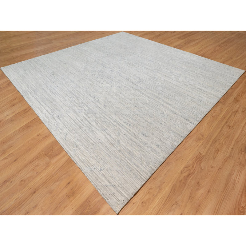 Tapis gris unique de 12 pi 1 po x 12 pi 1 po Souheil