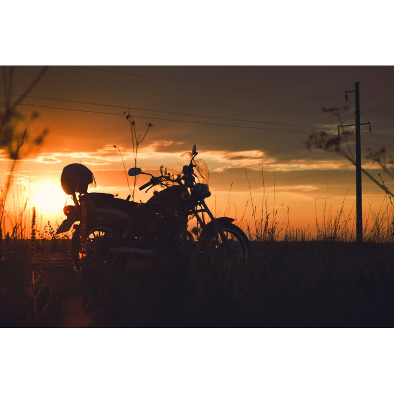 Silhouette Of A Motorcycle On The Road At Sunset by Osobystist - Wrapped Canvas Print, 30cm H x 46cm W x 3.8cm D