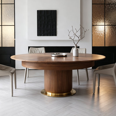 Table de salle à manger extensible en bois (150 à 200 cm) avec incrustation en forme d'étoile et pied central.