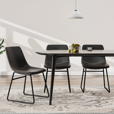 Chaise rembourrée en similicuir Ipke