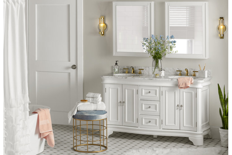 white bathroom remodel idea with glam metal accents and plush fabrics