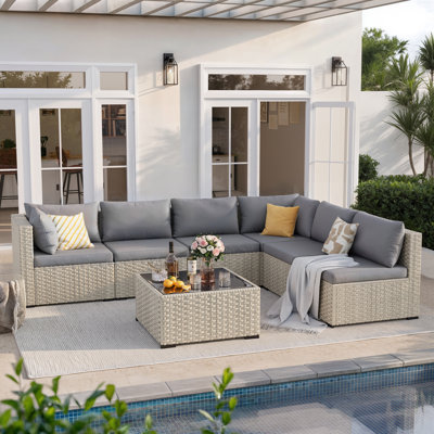 7 Piece Patio Conversation Set with Coffee Table and Cushions