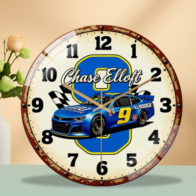 Distressed round metal clock: Chase Elliott #9 NASCAR car & checkered flag, bold black 2D numerals, silent quartz sweep, tempered glass cover. Retro racing decor for garages, man caves and racing fan spaces.