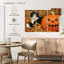 Citrouille d'Halloween et chaton noir-1141771598
