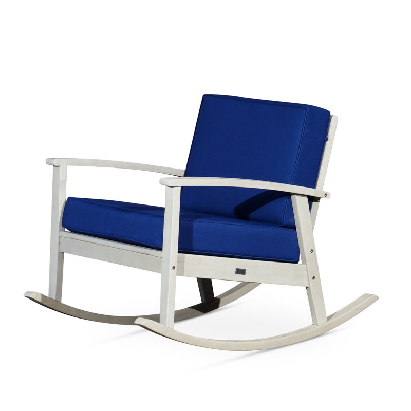 Chaise berçante en eucalyptus avec coussins bleu marine élégants, finition de jardin grise en bois flottant confortable pour le patio