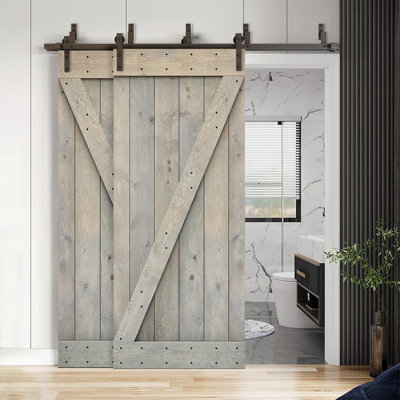 Porte de grange à panneaux et en bois avec quincaillerie d'installation