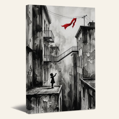 Silhouette d'une fille tendant la main vers une écharpe rouge entre deux immeubles - Tableau sur toile