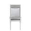 Chaise d'appoint en tissu et platine 2 - Assise fixe, capacité de 100 kg. Profondeur du siège : 51 cm, hauteur : 48 cm. Superbe forme rectangulaire ornée d'incrustations de strass scintillants. Rembourrage moelleux pour le siège et le dossier. Plateau en bois tourné.