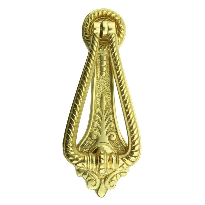 Heurtoir de porte en laiton à finition ornementale