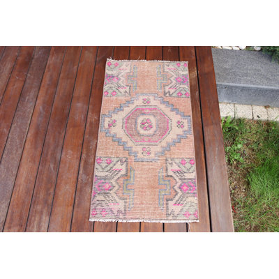 Tapis turc rétro en laine Oushak rose pour une touche d'élégance bohémienne dans les petits espaces