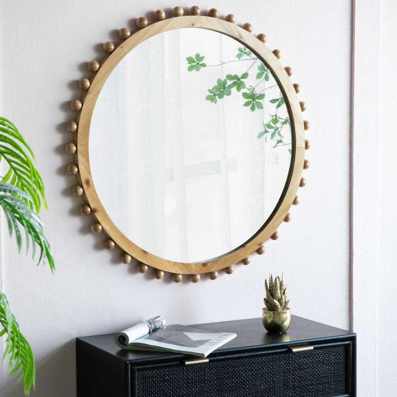 Miroir rond en bois avec cadre perlé