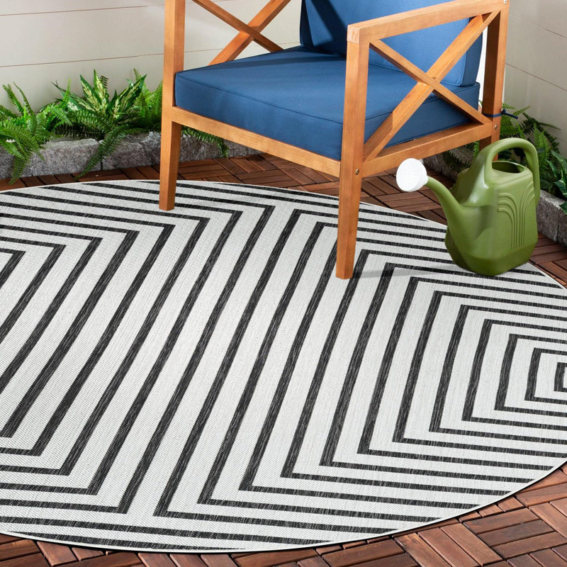 Geometric Machine Woven Polypropylene Indoor / Outdoor Area Rug in White/Black, Round 13'1"