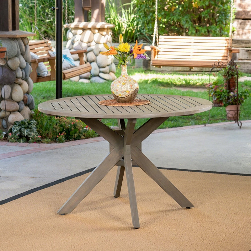 Table de salle à manger d'extérieur ronde en bois d'acacia avec base en X