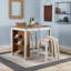 Ensemble de table de bar Farmhouse avec prise de courant et deux tabourets rembourrés-134771117