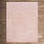 Tapis rose à motif géométrique-19863321