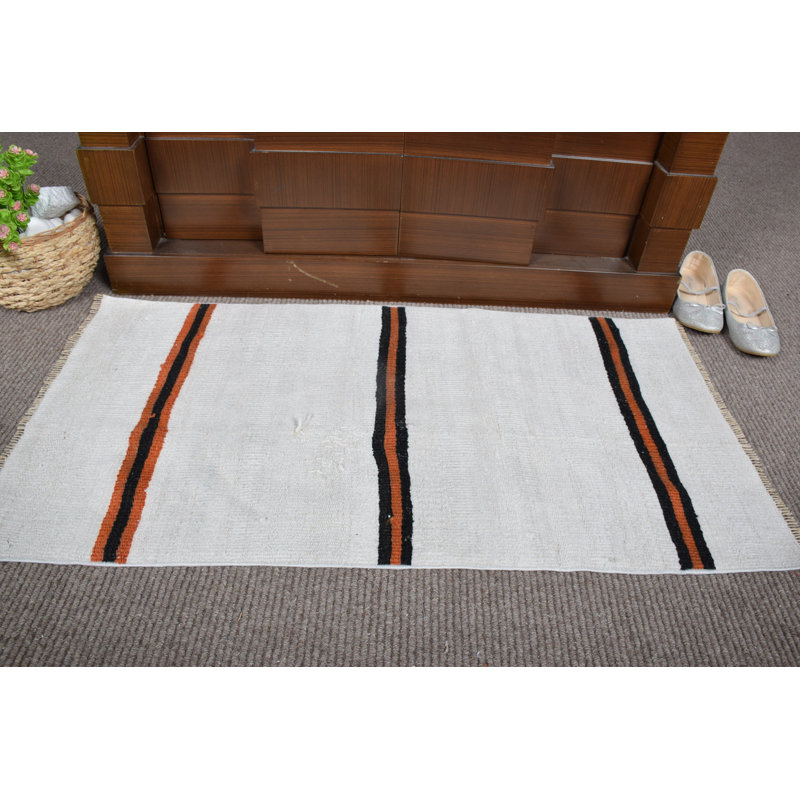 Tapis de porte turc fabriqué à la main dans un style rétro avec des rayures blanches et oranges frappantes