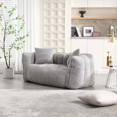 Fauteuil à billes doux avec noyau en mousse haute résilience pour deux personnes.