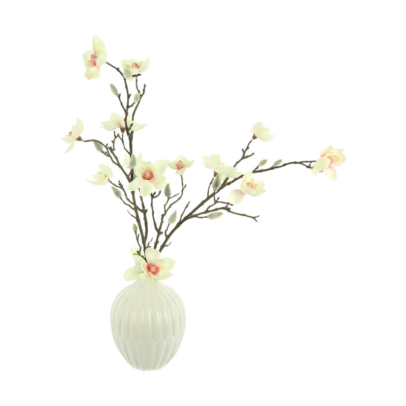 Centre de table magnolia dans un vase