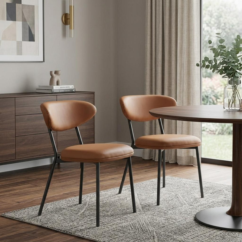 Ensemble de deux chaises d'appoint à dossier ouvert en similicuir brun et noir