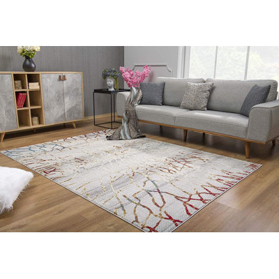 Tapis doré / doré à branches abstraites