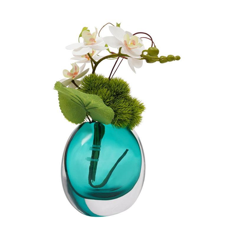 Arrangement de fleurs artificielles dans un vase, Bleu