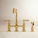 Kingston Brass Heritage Two-Handle 4-Hole Deck Mount Bridge Kitchen Faucet with Brass Side Sprayer