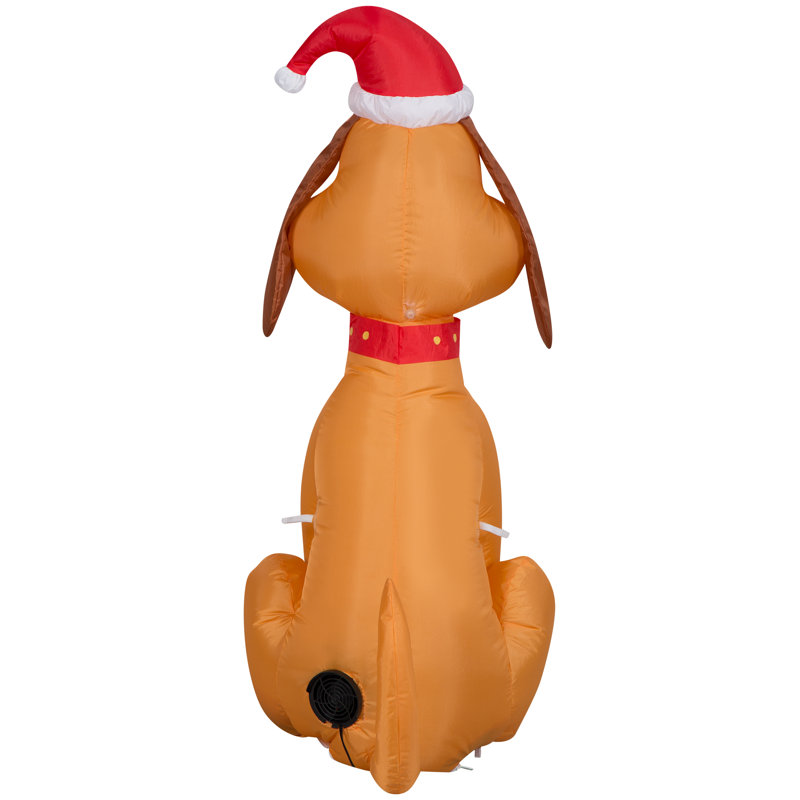 Gonflable Max le chien portant un chapeau de père Noël gonflable
