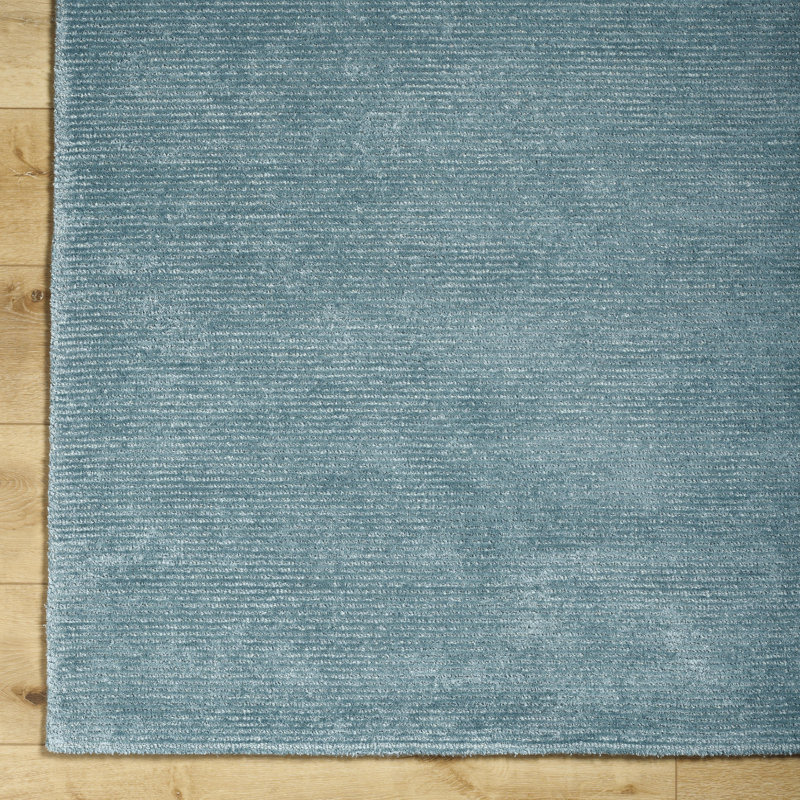 Tapis en viscose / laine touffeté à la main de couleur turquoise Dishaun, Rond 10 pi