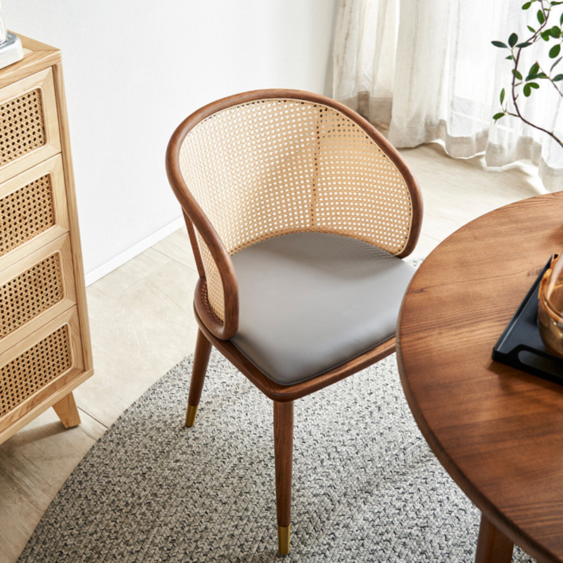 A casual dining chair made of ash wood rattan