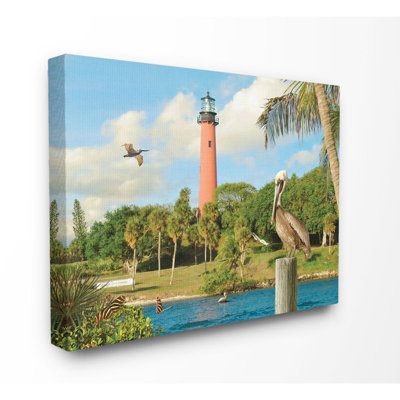 " Juptier Inlet Bright Red Lighthouse With Tropical Birds And Palm Trees " by Alan Giana & Company