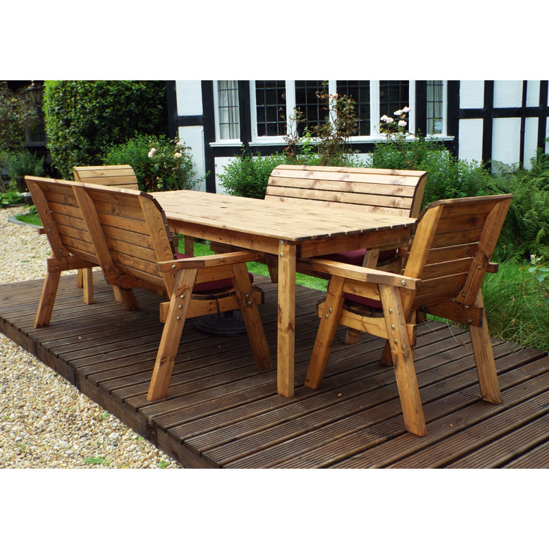 Fischer 8 - Person Wood Patio Dining Set with Rectangular Table , Cushions Included, Burgundy
