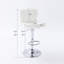 Tabouret de bar pivotant à oreilles capitonné