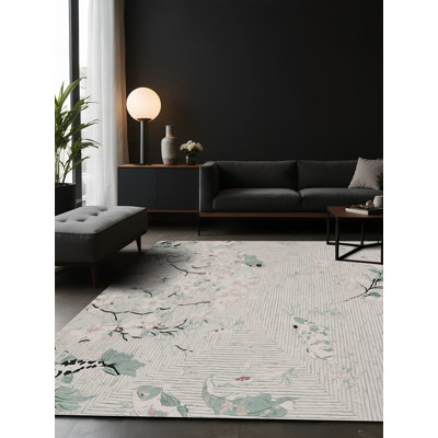 Tapis gris soyeux et moelleux