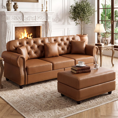82.6" Mid-Century Modern Chesterfield Tufted Sofa Upholstered Faux Leather 3-Seater Couch With Ottoman And 3 Pillows