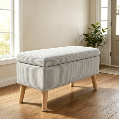 Banc de rangement en velours côtelé beige 32 pouces de large avec pieds en bois, boîte de rangement rabattable, banc de bout rembourré doux, repose-pieds et banc à chaussures pour la chambre à coucher, le salon, le vestibule