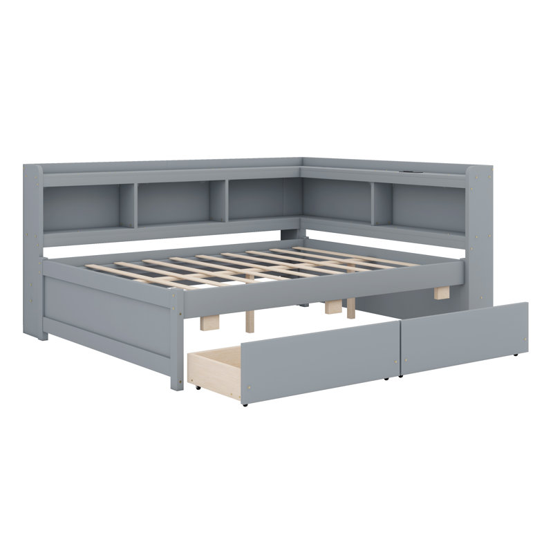 Structure de lit d'angle en bois massif avec bibliothèque intégrée, tête de lit en forme de L, prises électriques, ports USB et tiroirs de rangement