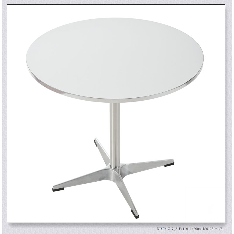 Table à manger circulaire moderne et petite table à thé, avec un style minimaliste, convenant à une utilisation dans les salles à manger familiales, les cuisines et les salons
