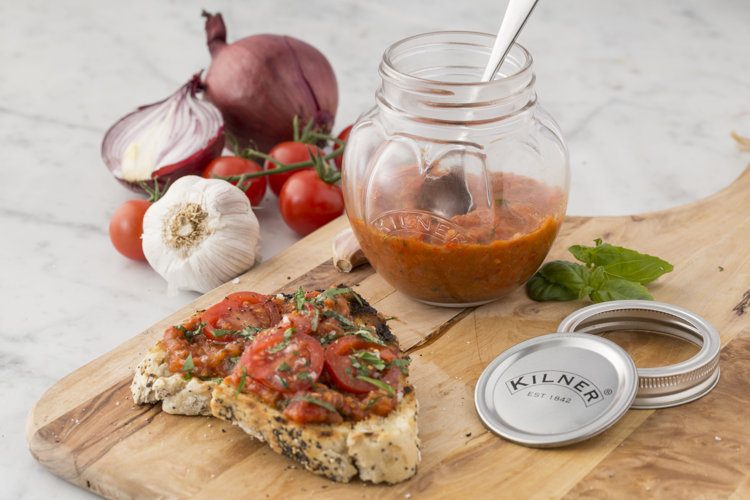bread with a homemade tomato paste spread on it