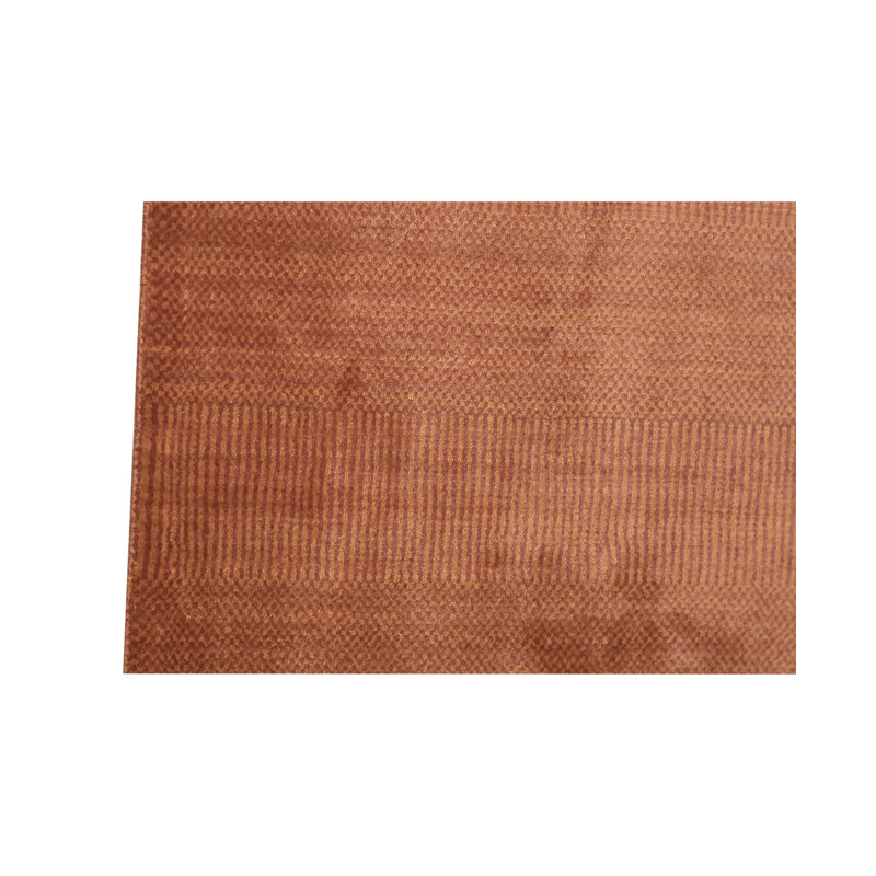 Area Rug in Rust Brown