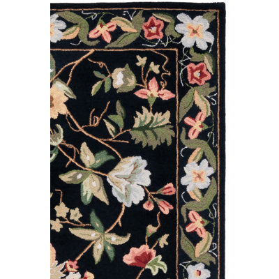 Hollander Floral Handmade Looped/Hooked Wool Black Area Rug