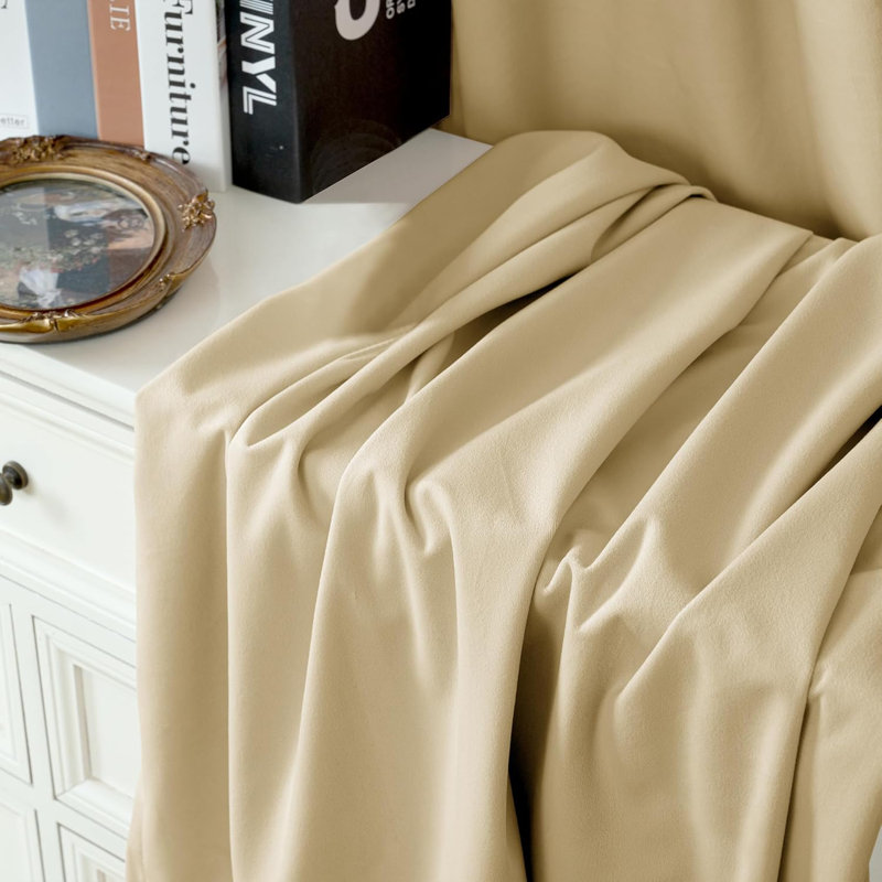 Castres Velvet Solid Color Noise Reducing Blackout Grommet Curtain Panels for Home & Office, 52" W x 108" L, Cream Yellow