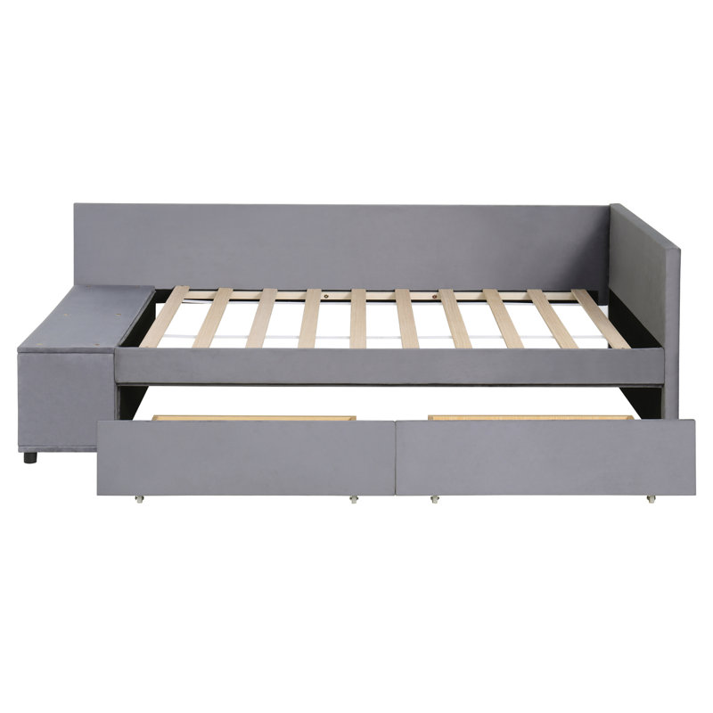 Lit plateforme simple tapissier en forme de L avec rangement et tiroirs, gris