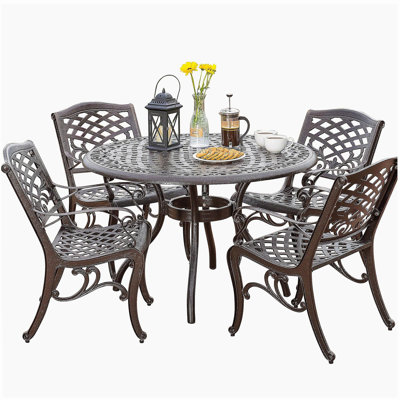 Dieter 4 - Person Metal Patio Dining Set with Round Table