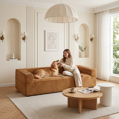 Canapé moderne sans os de 234 cm de large, en velours côtelé comprimé, avec porte-gobelets et rangement.