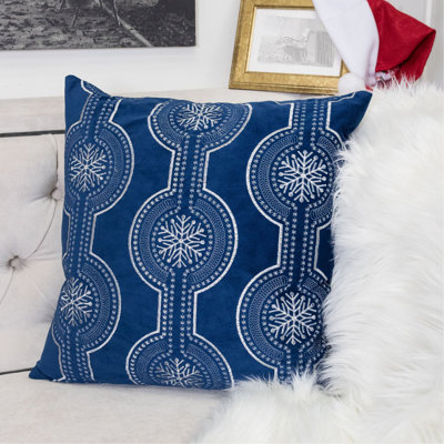 Coussin Holiday en velours bleu avec broderie flocon de neige blanc