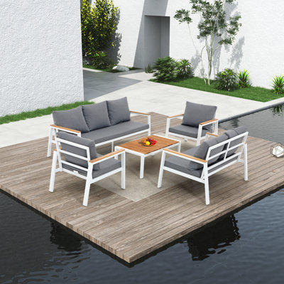 Aprillynn Teak 7 - Person Patio Conversation Sets with Cushions