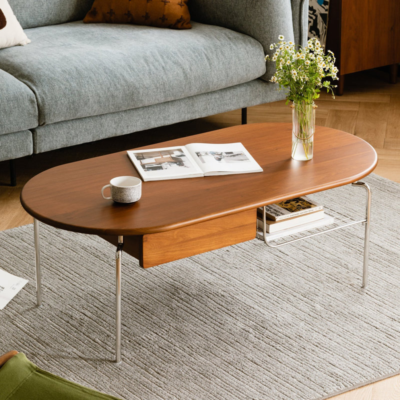 Table basse ovale vintage en bois massif avec tablette et tiroir