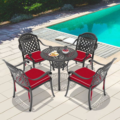 Ensemble de salle à manger d'extérieur 5 pièces, table ronde de 78 cm avec trou pour parasol et 4 chaises empilables, coussins rouges