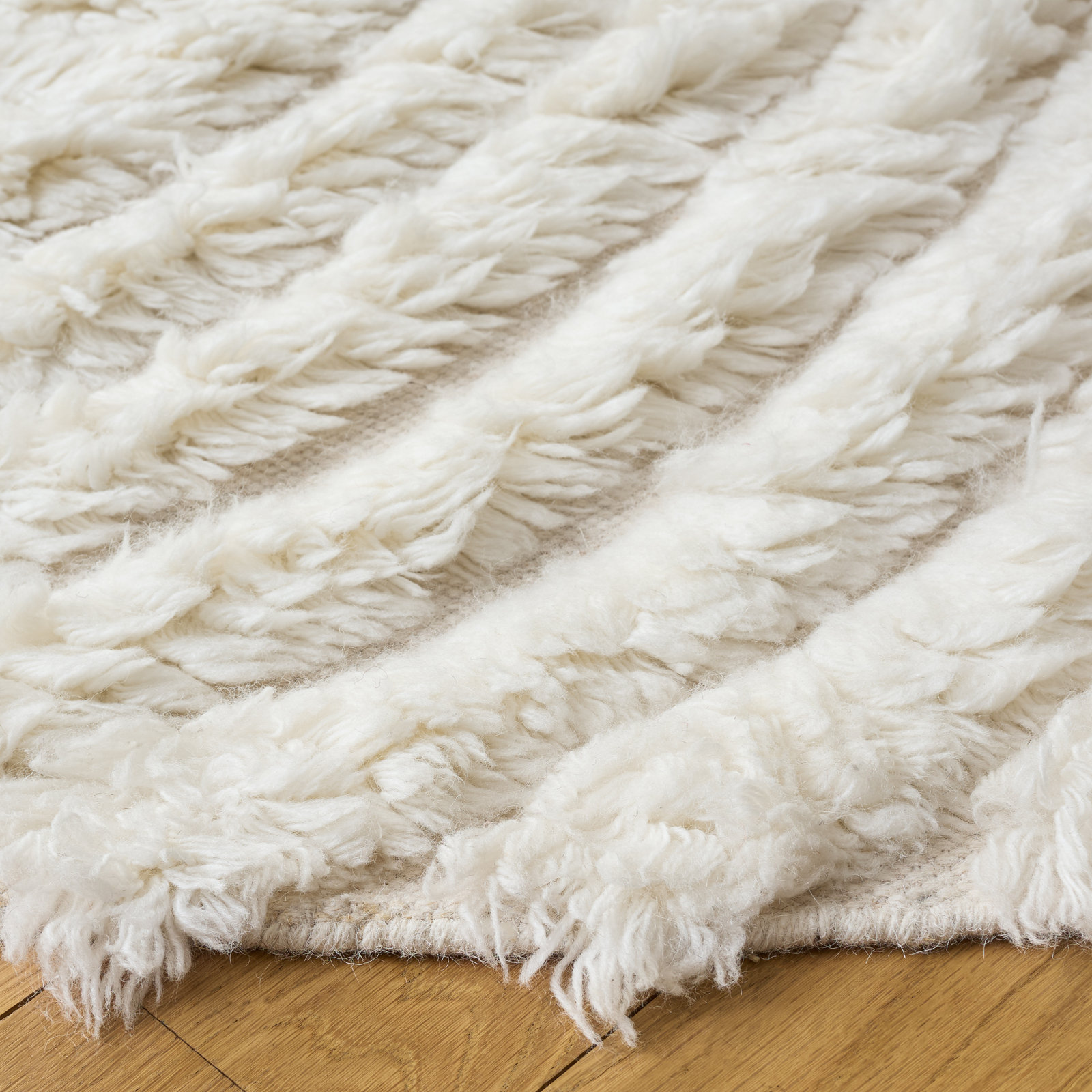 Abriel Ivory Hand-Woven Abstract Wool Rug, Round 7'
