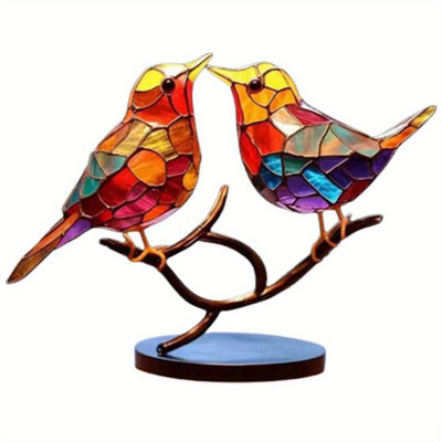 Figurine d'oiseau en acrylique sur une branche